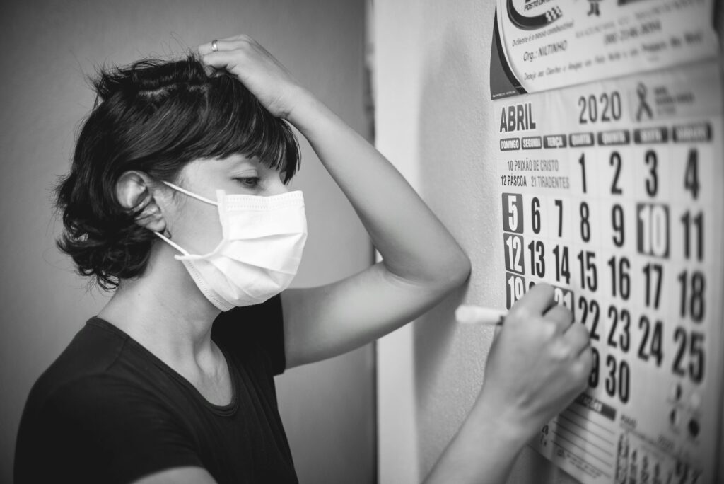 Credit card user paying monthly bills on schedule.
